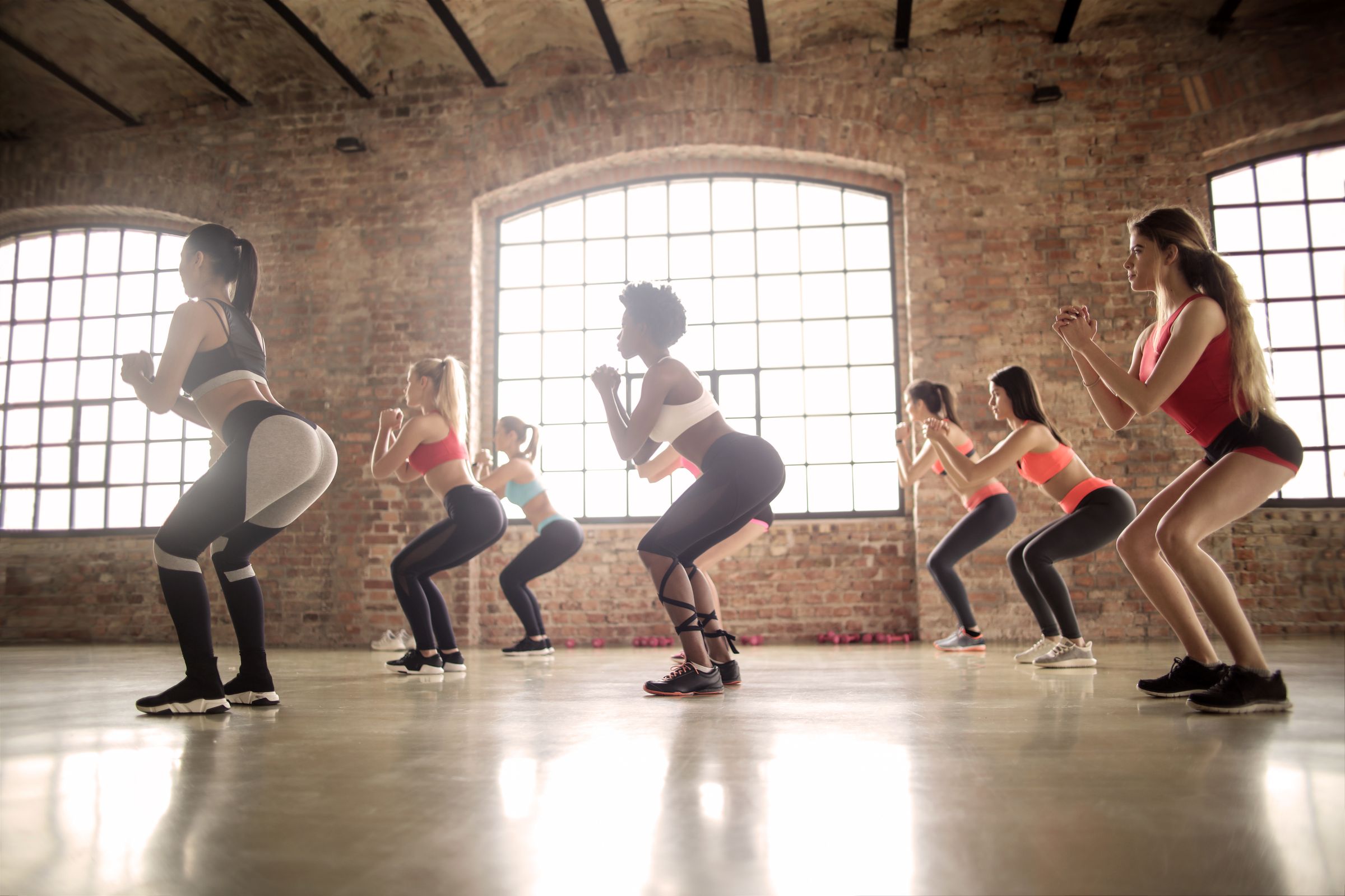 Group fitness class in a bright studio